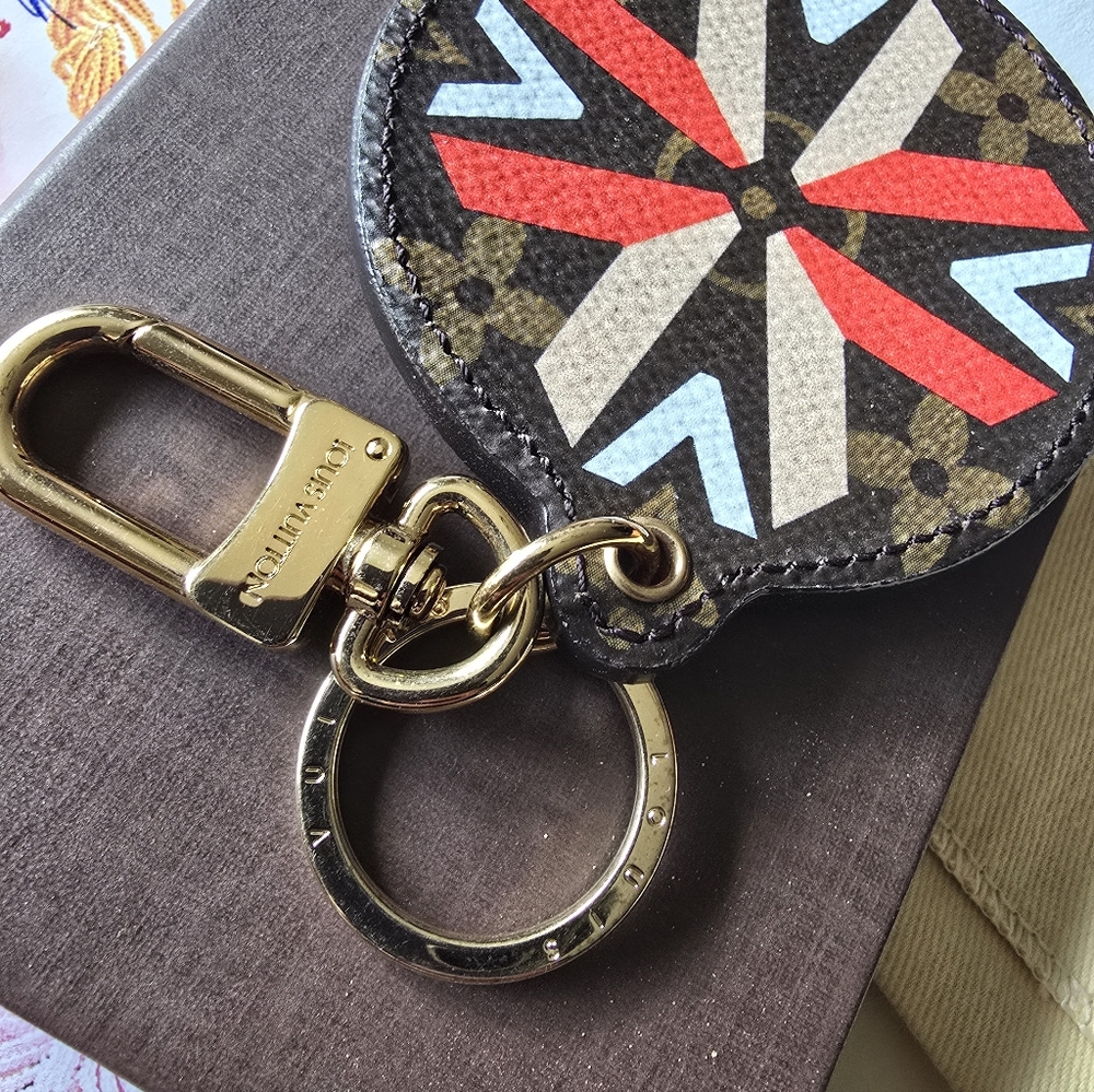 Authentic Louis Vuitton Round Monogram Keychain Or Charm